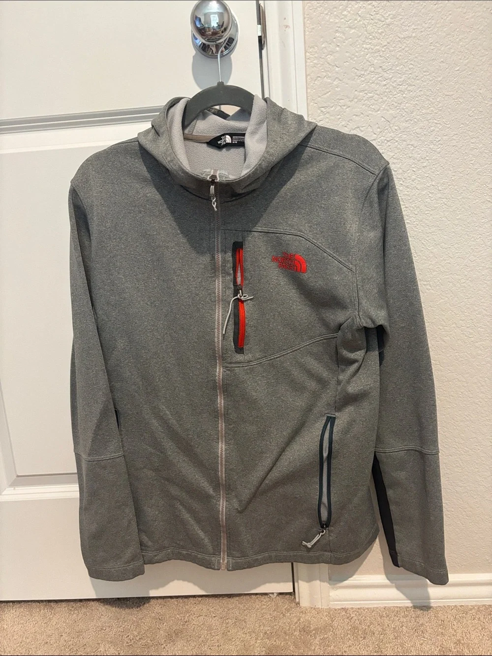 The North Face Men's Gray Hooded Lightweight Jacket with Red Accents